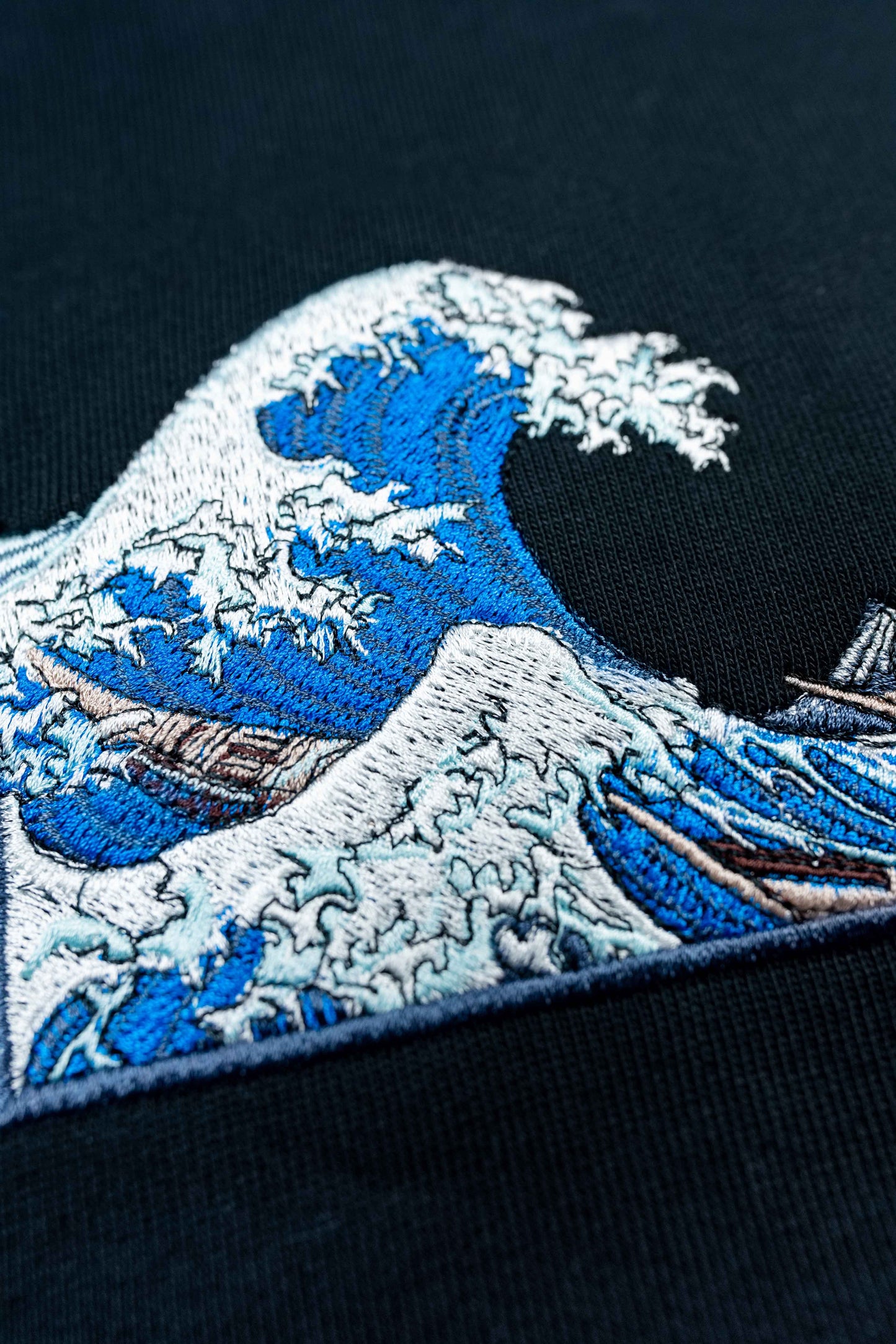 Unisex organic cotton hoodie featuring The Great Wave off Kanagawa design.