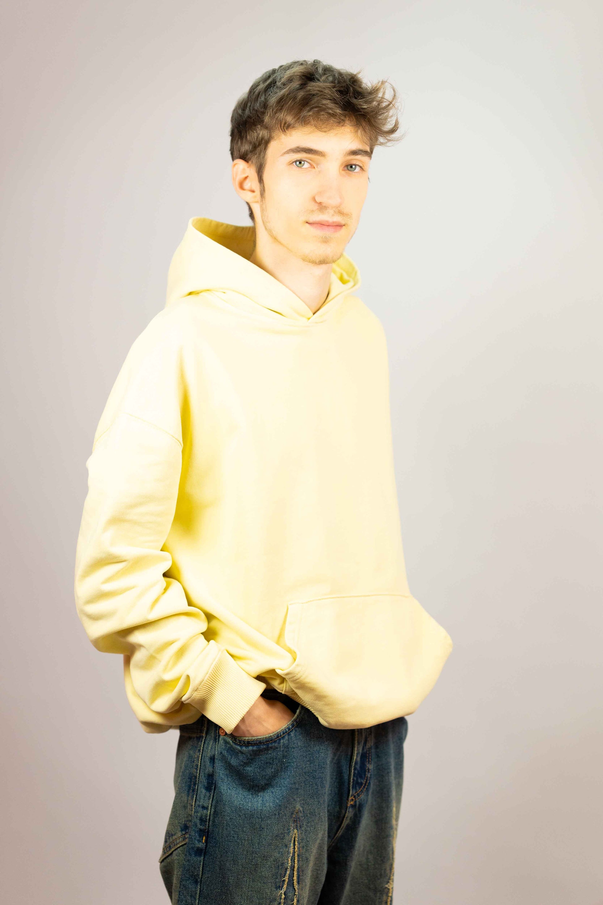 Unisex oversized hoodie inspired by Michelangelo’s David, crafted for comfort and style.