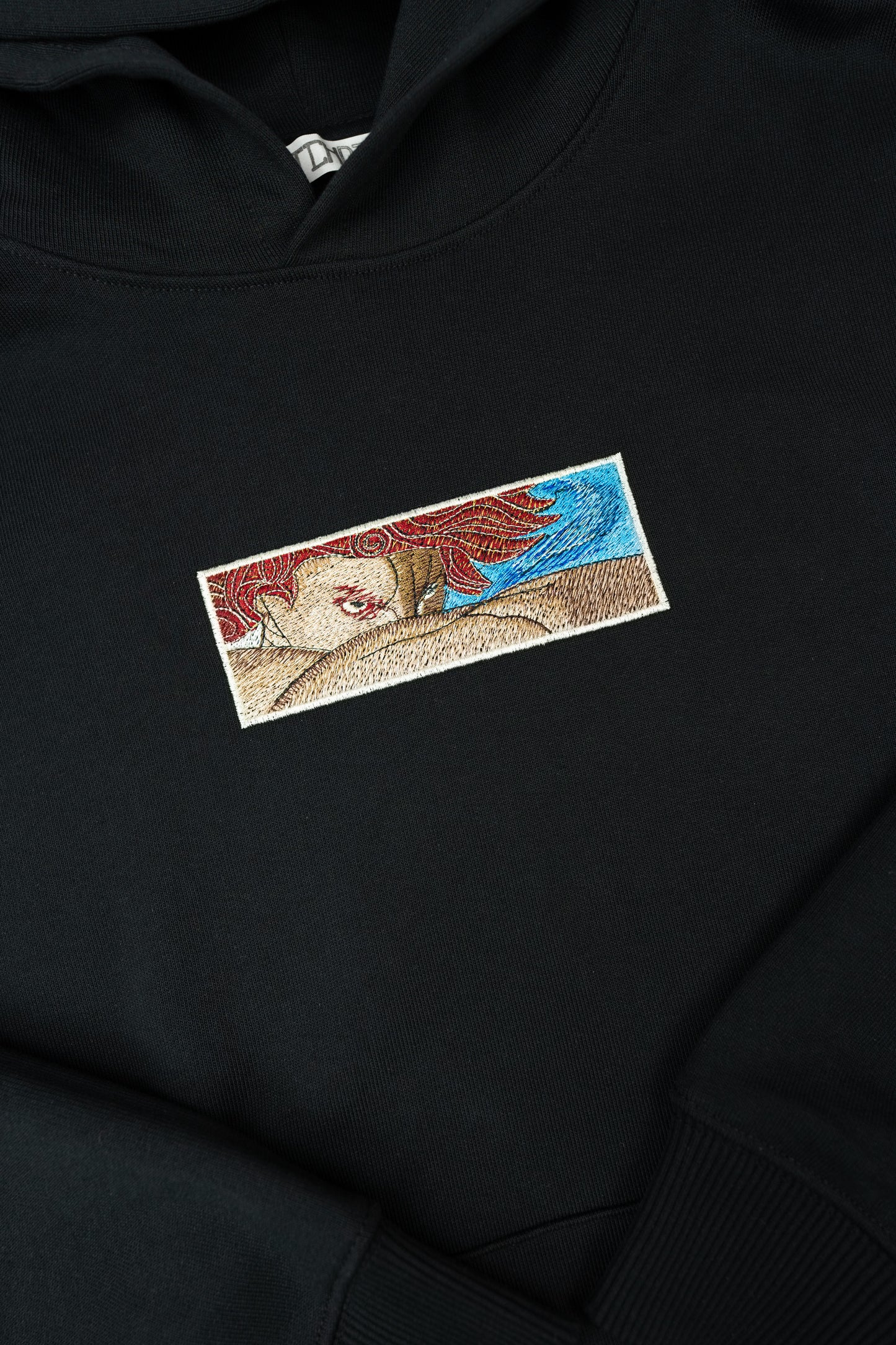 Luxury unisex organic cotton Hoodie with Fallen Angel design.