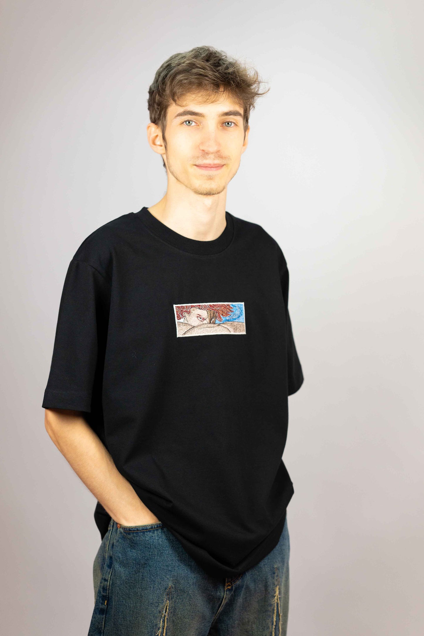 Premium unisex T-shirt crafted from organic cotton with Fallen Angel embroidery.
