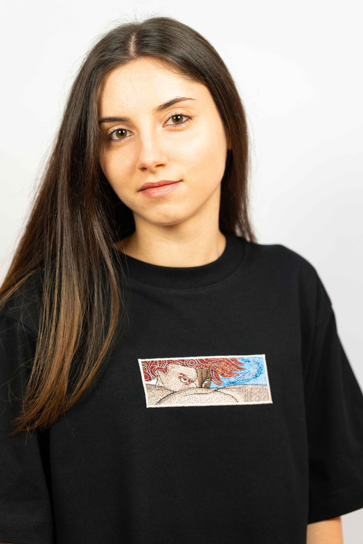 Unisex T-shirt crafted from sustainable cotton featuring Fallen Angel artwork.