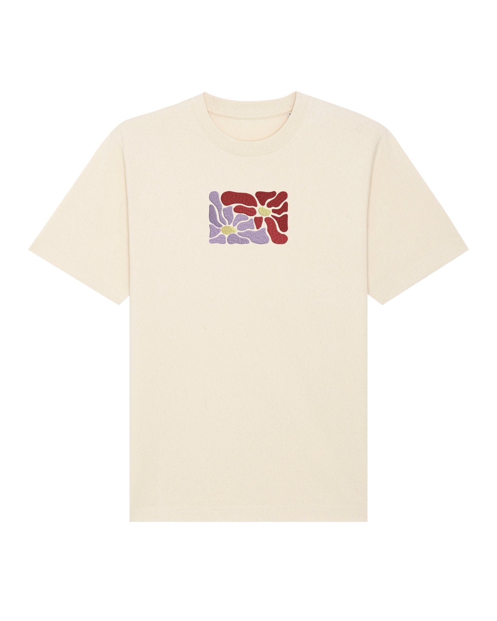 Women’s oversized organic cotton t-shirt with bespoke floral embroidery.