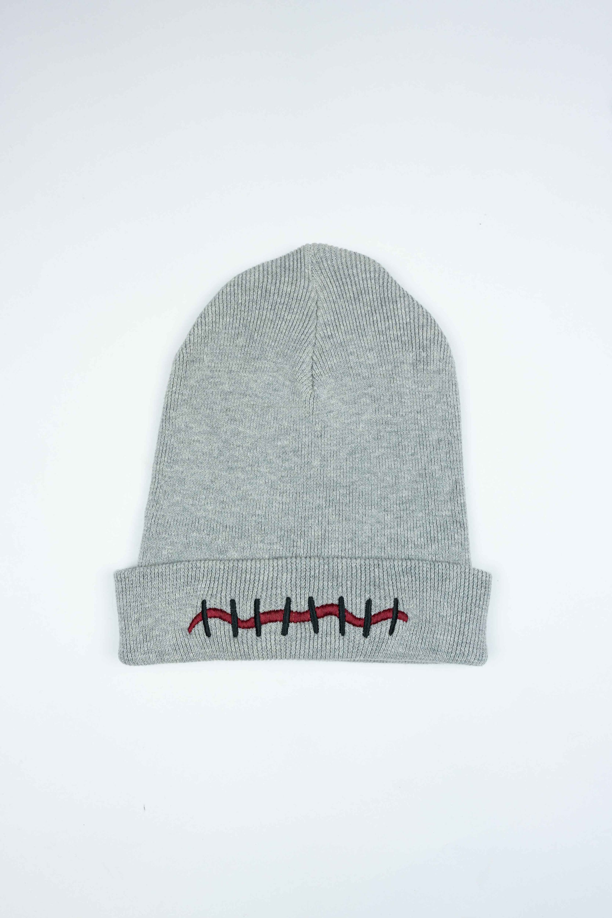 Luxury gray organic cotton beanie with unique Mouth Scar design.