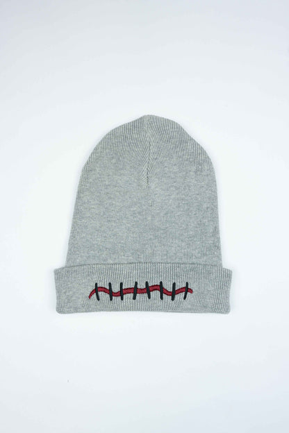 Luxury gray organic cotton beanie with unique Mouth Scar design.