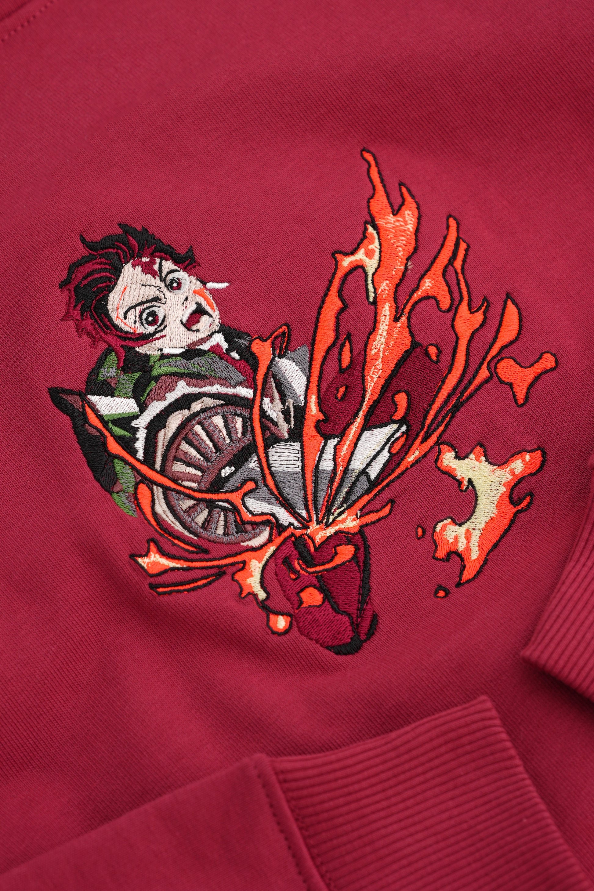 Red closeup image of embroidery Tanjiro Hoodie - Stitchdom