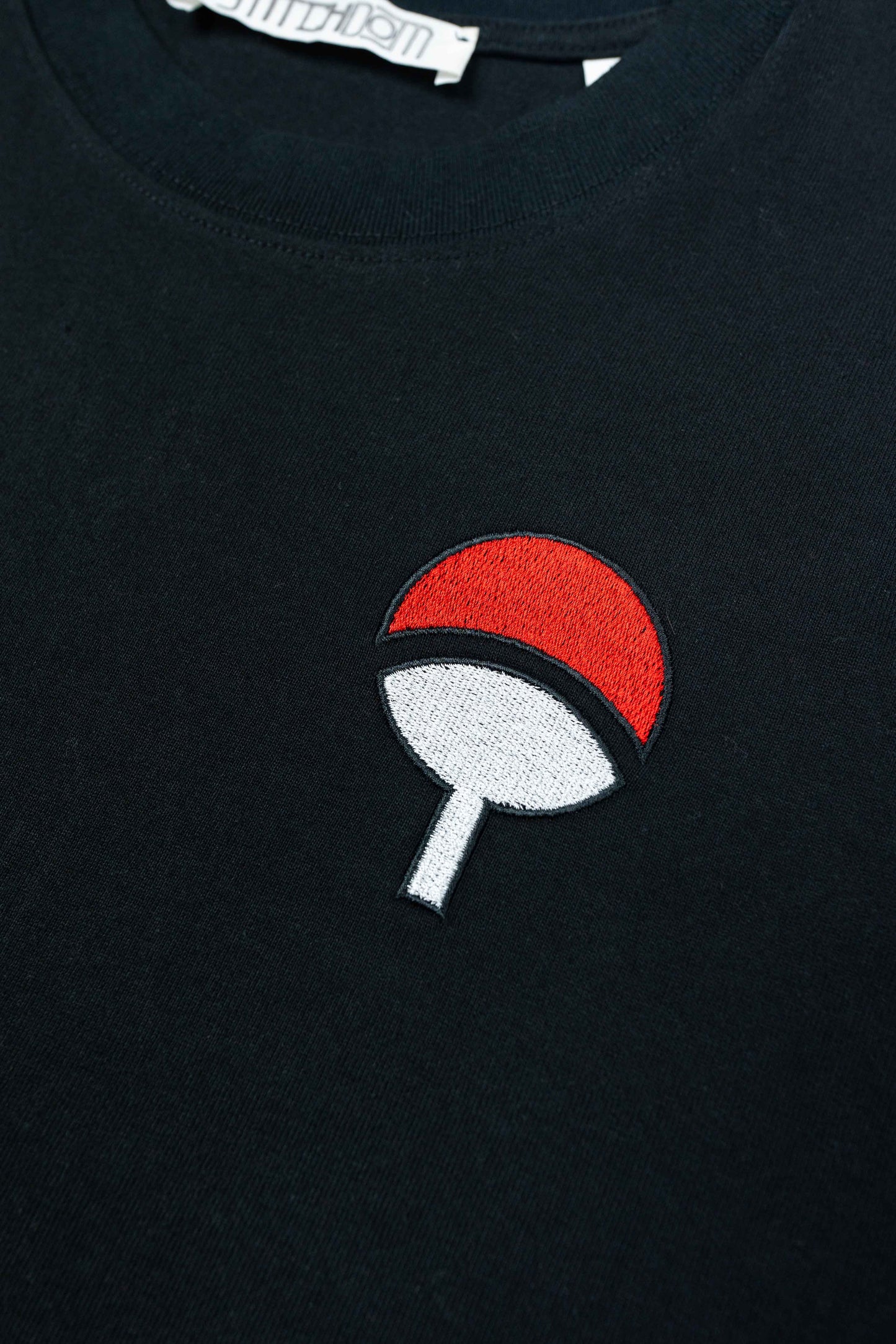 Unisex organic cotton t-shirt featuring Sasuke Uchiha design in premium quality.