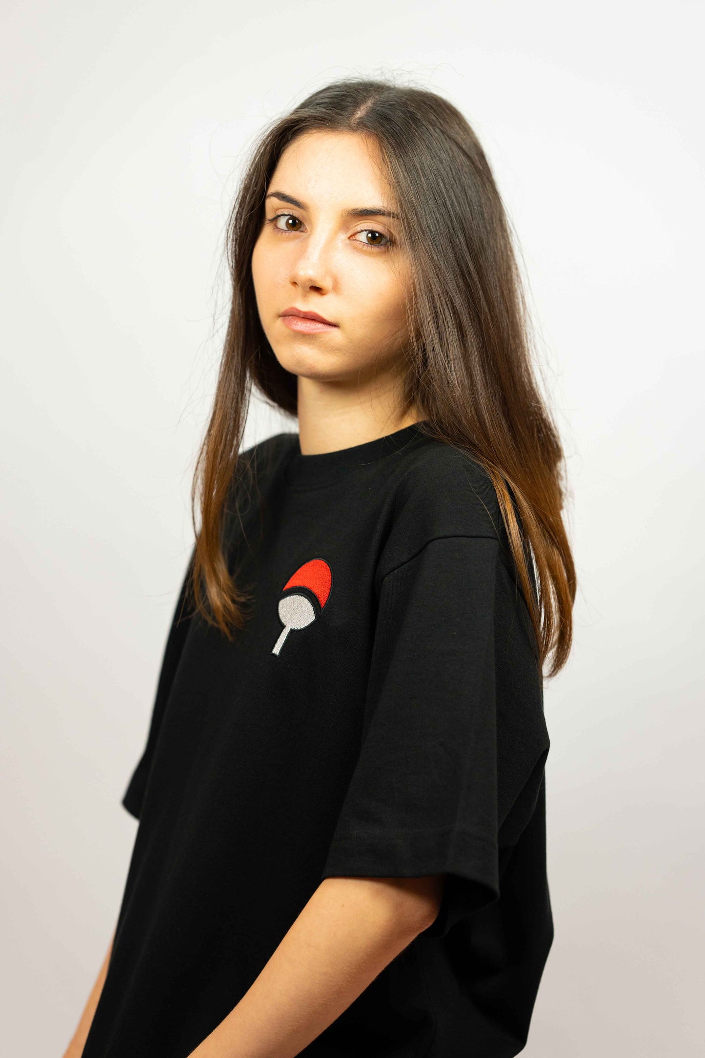Sustainable organic cotton t-shirt with Sasuke Uchiha embroidery for men and women.