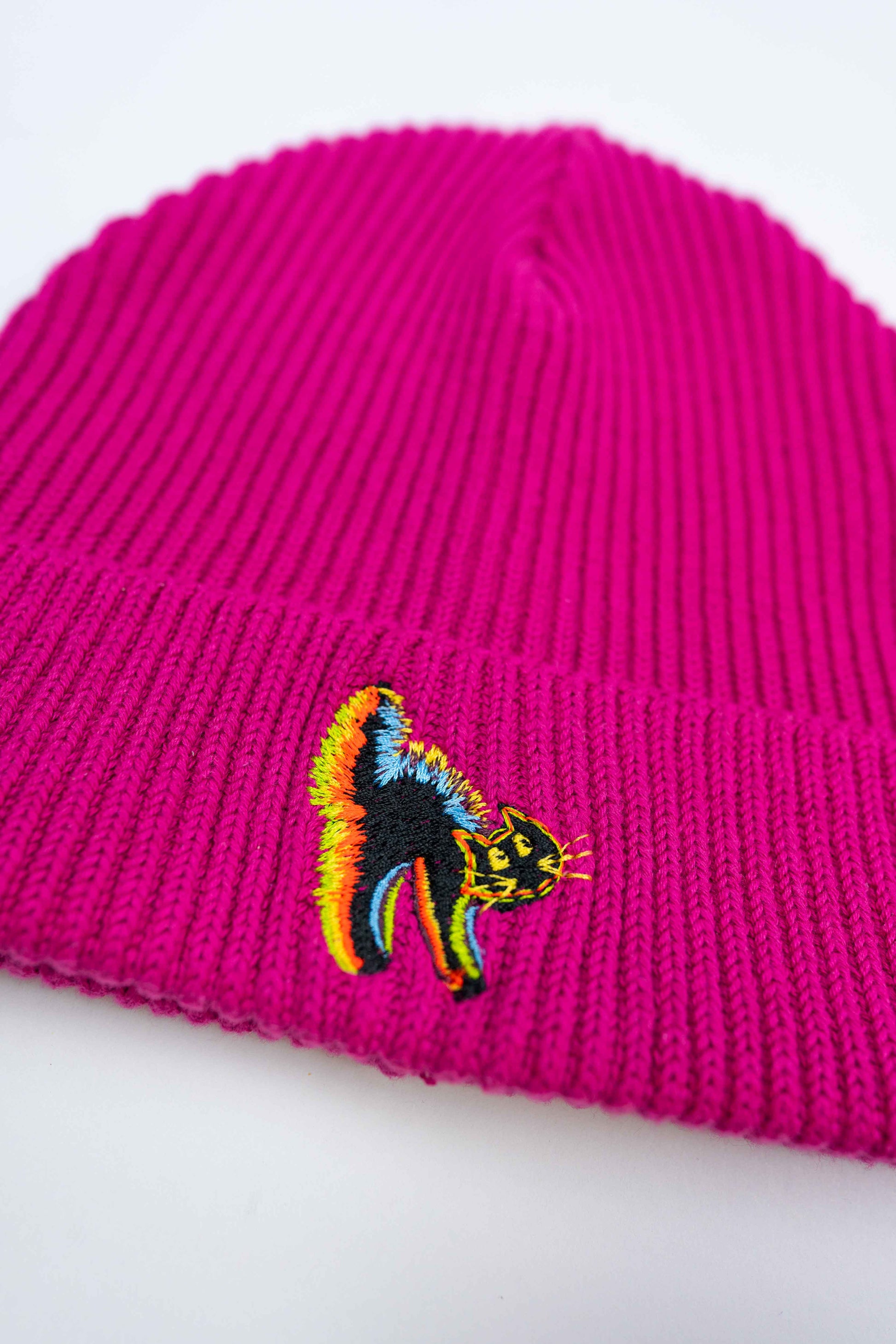 Comfortable and breathable organic cotton beanie with Scaredy Cat artwork.