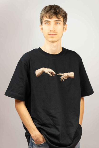 Luxury t-shirt crafted from organic cotton with detailed The Creation of Adam embroidery.