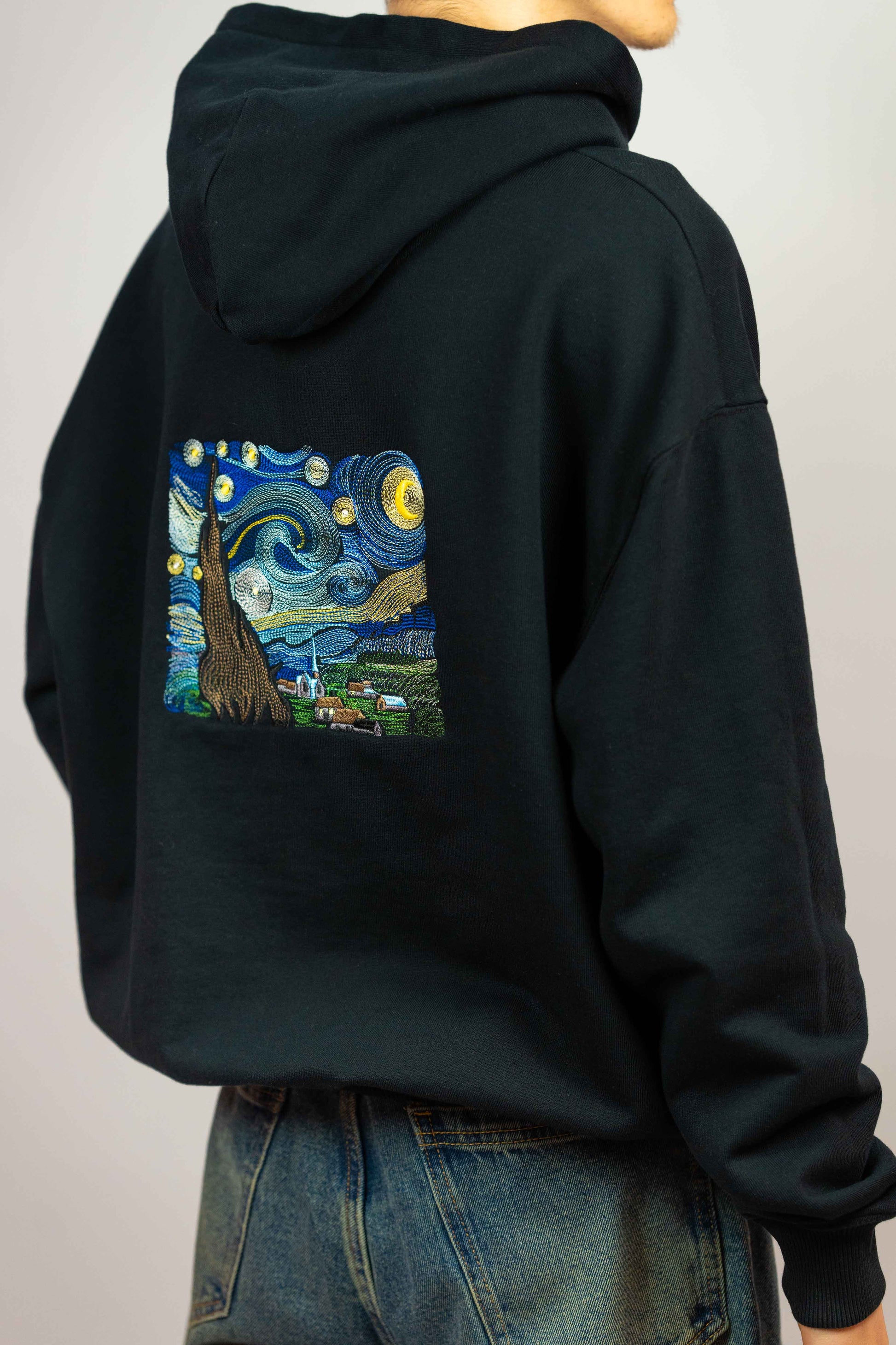 Unisex organic cotton hoodie featuring The Starry Night design.