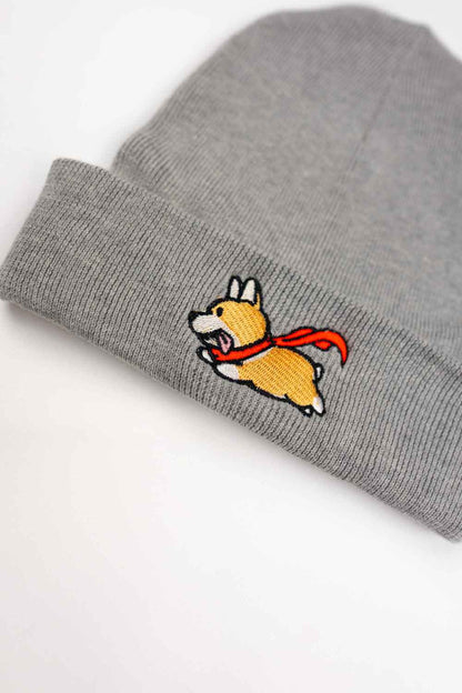 Căciulă gri brodată cu design de câine mic, un accesoriu călduros și stilat pentru iubitorii de animale.
