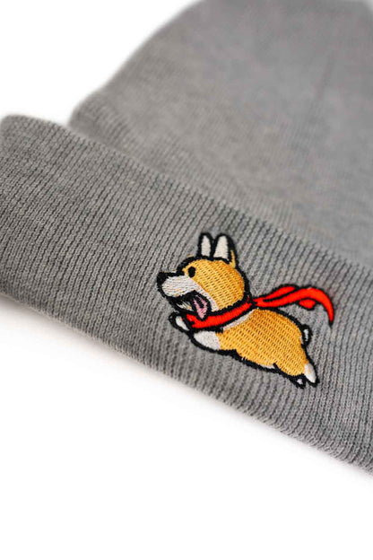 Căciulă gri brodată cu design de câine mic, un accesoriu călduros și stilat pentru iubitorii de animale.