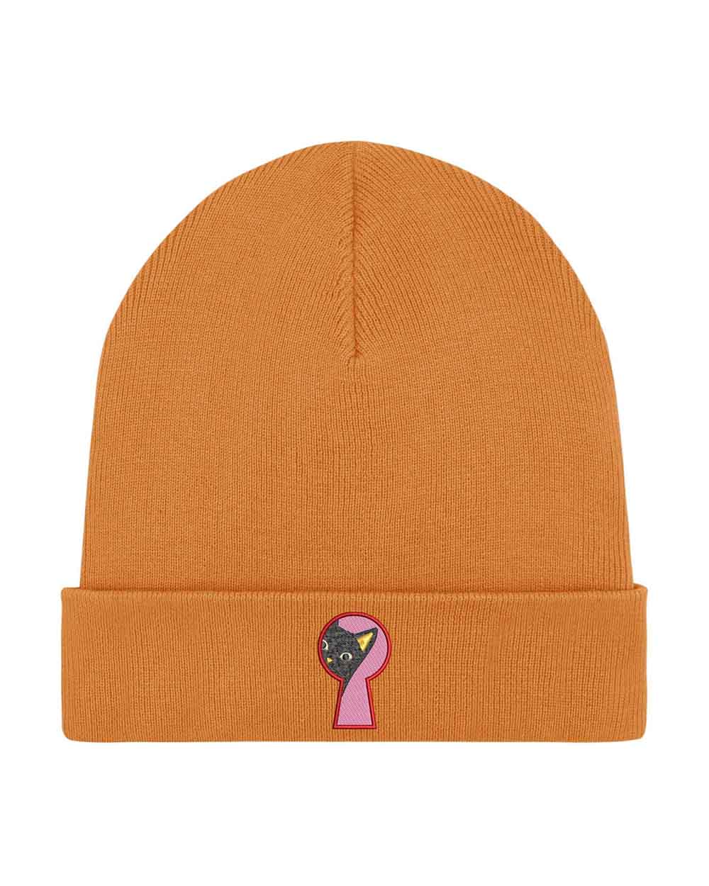 Căciulă portocalie din tricot cu manșetă întoarsă, brodată cu un design de cheie în culorile roz, negru și galben, un accesoriu minimalist și creativ pentru un stil casual.